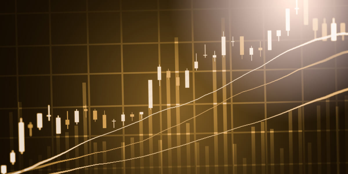 A stock chart with fluctuating candlestick patterns and a line graph overlay.