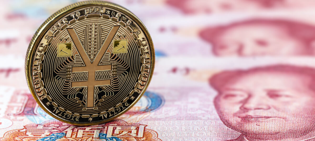  A symbolic gold coin with the yuan currency sign, representing China's push toward digital currency adoption.