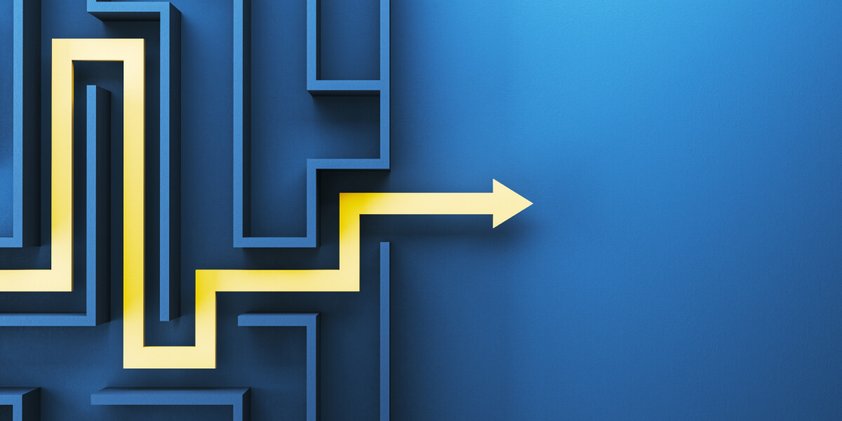 A blue maze-like structure with a bold yellow arrow cutting through, representing problem-solving or finding a solution.