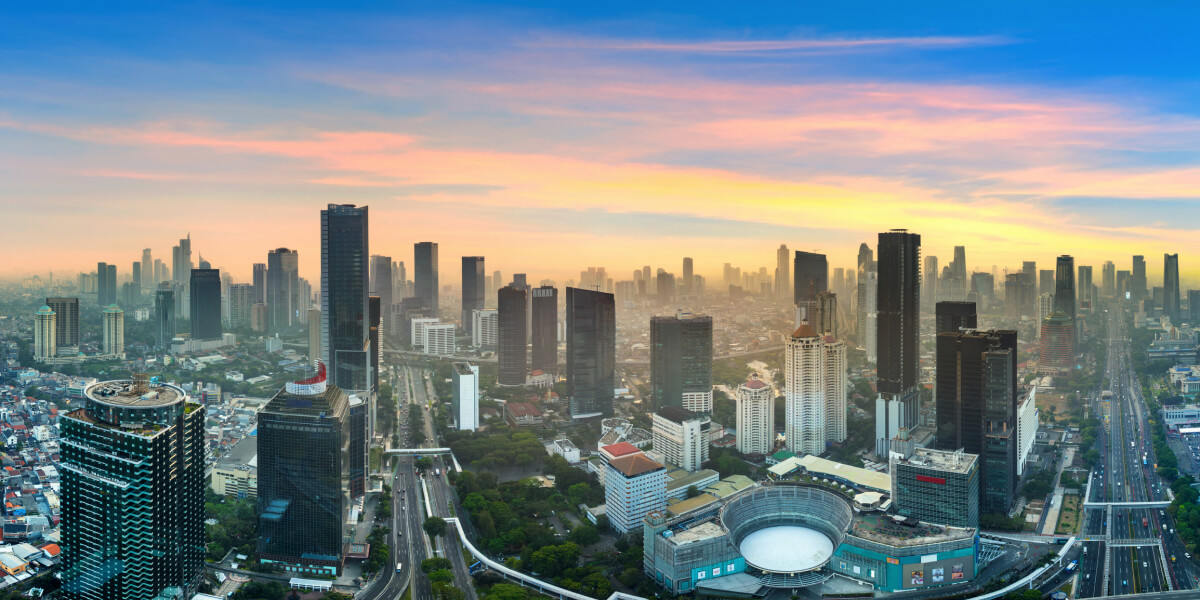 a top view on Jakarta, with wide streets and high buildings